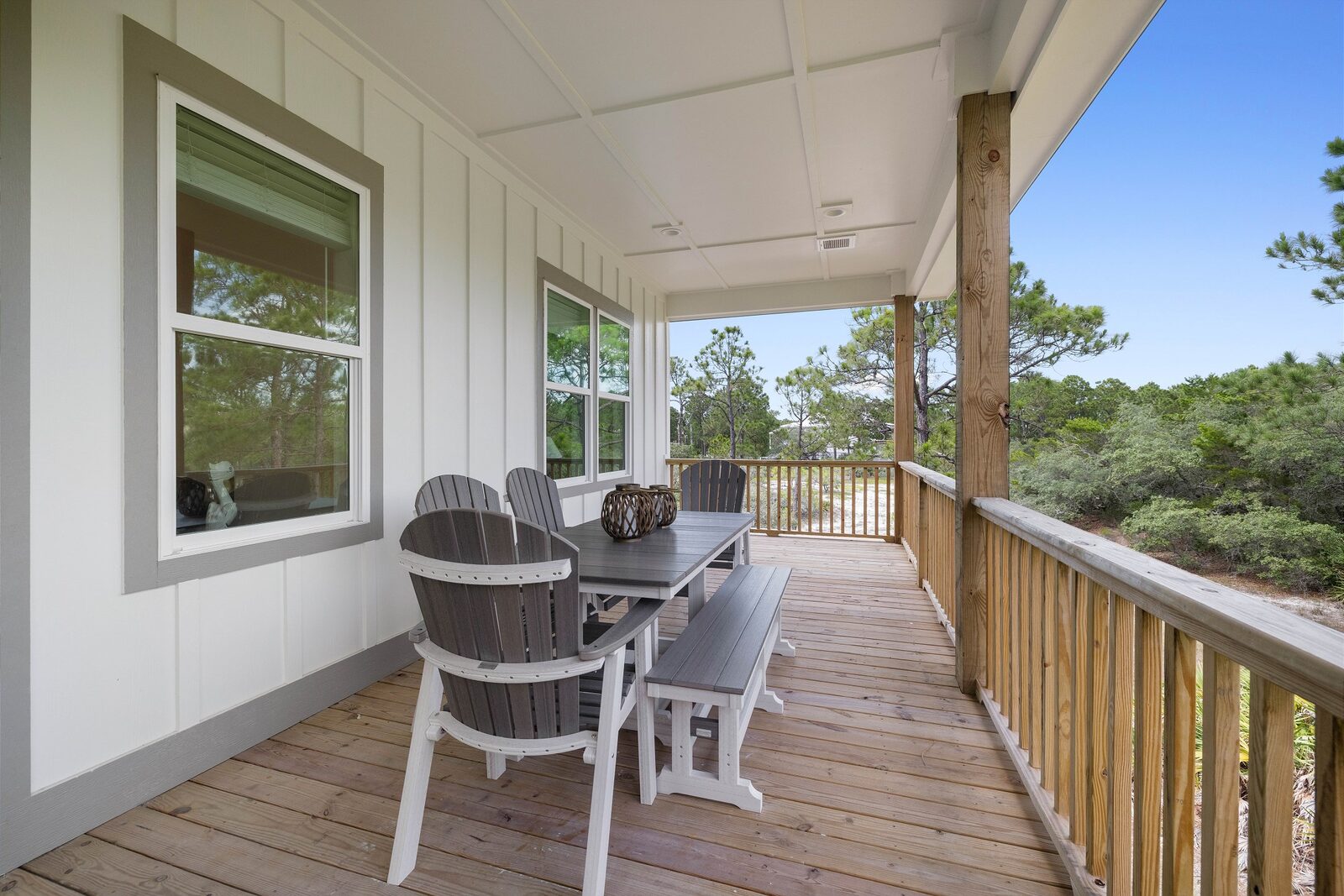 Covered porch with seating and views